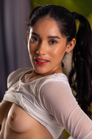 Carolina Guerrero Pulls Her Panties Aside In Pink Leg Warmers